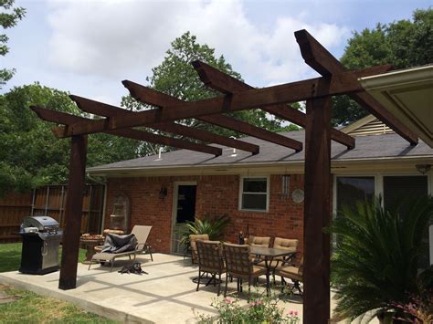 how to attach pergola to house roof